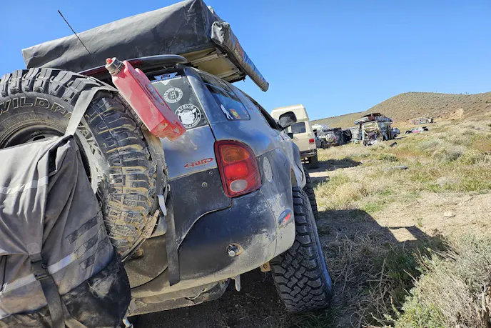 Isuzu VehiCROSS climbing a steep, rocky mountain incline.