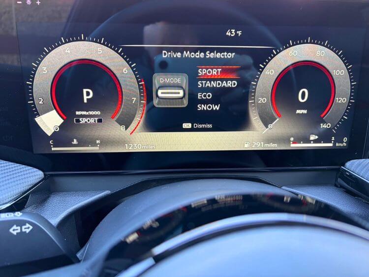 Close-up view of the 2026 Nissan Kicks center console drive mode selector.